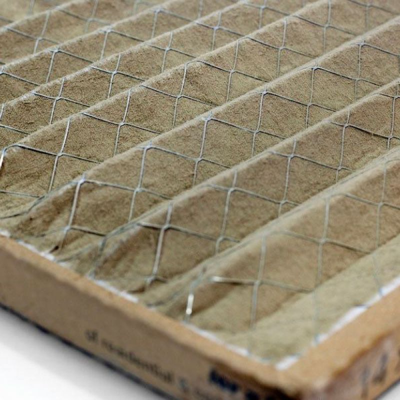 Close-up of a pleated HVAC air filter showing its intricate mesh pattern for improved indoor air quality.